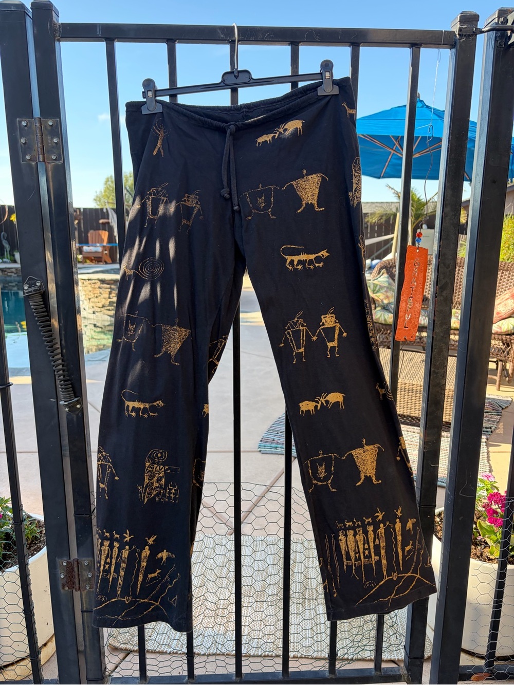 Black womens Drawstring Pants with Gold Print